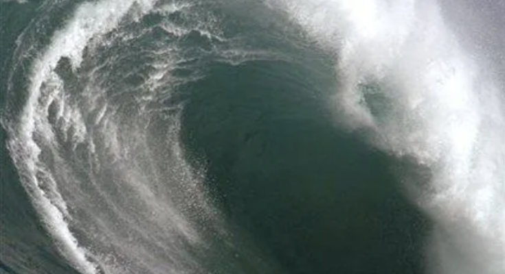 WATCH: Surfers ride monster waves at Hawaii competition that also provides big wipeouts