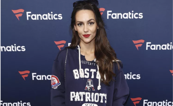 Jordon Hudson Wears Patriots Sweatshirt Dress as Boyfriend Bill Belichick Walks Separately into Fanatics Super Bowl Party