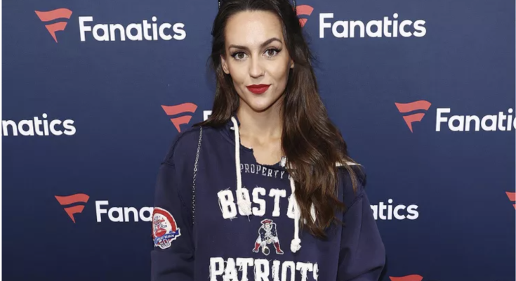 Jordon Hudson Wears Patriots Sweatshirt Dress as Boyfriend Bill Belichick Walks Separately into Fanatics Super Bowl Party