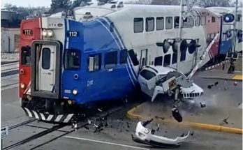 Driver Rear-Ended onto Train Tracks Escapes Crash with Seconds to Spare in Shocking Video