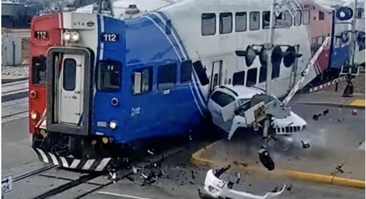 Driver Rear-Ended onto Train Tracks Escapes Crash with Seconds to Spare in Shocking Video