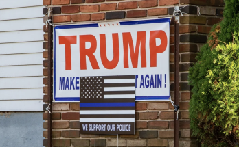 Trump flag in Massachusetts police station gym divides town as chief, official feud over its removal: report